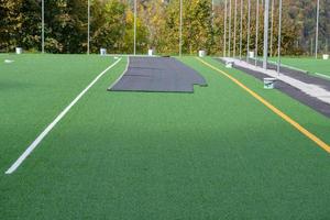 Laying of synthetic grass photo