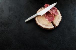 sliced raw pork meat photo