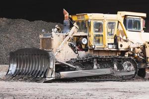 Bulldozer in construction site photo