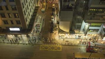 HONG KONG NOVEMBER 10, 2019 - Time lapse of busy street with traffic and pedestrians at night in Hong Kong video