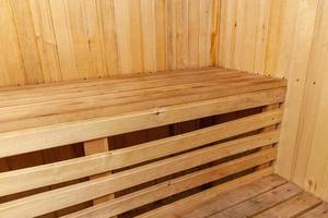 Interior details of traditional Finnish sauna steam room. Traditional old Russian bathhouse SPA Concept. Relax country village bath concept. photo