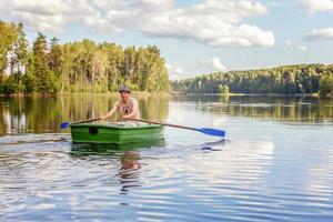 Fisherman in a boat photo