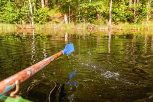 Oar paddle from row boat photo