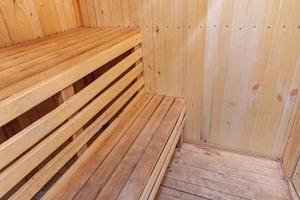 Interior details of traditional Finnish sauna steam room. Traditional old Russian bathhouse SPA Concept. Relax country village bath concept. photo