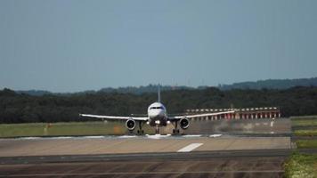 Front view, take off of an airplane. Passenger airliner gains altitude after takeoff video