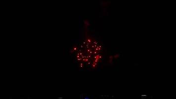 Colorful bright fireworks showin the night sky at City day festival, Novosibirsk, Russia video