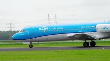 AMSTERDAM, THE NETHERLANDS JULY 27, 2017 - KLM Cityhopper Fokker 70 PH KZM braking after landing at runway 36L Polderbaan. Shiphol Airport, Amsterdam, Holland video