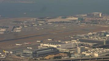 HONG KONG NOVEMBER 09, 2019 - Aerial view timelapse of Hong Kong International Airport Chek Lap Kok, view from Lantau Island video