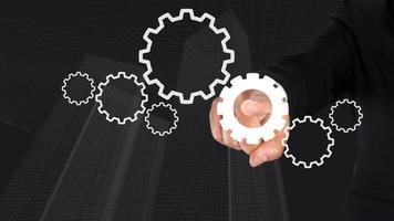 The concept of working together as a team, Small and large cogs work together to spin and push tasks forward. photo
