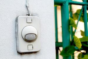 Doorbell in front of the house photo