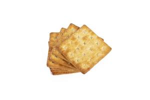 crackers sprinkled with sugar isolated on white background with clipping path. healthy whole wheat cracker photo