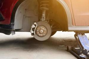 brake discs without wheels.car maintenance concept. Remove the wheels of the car in preparation for tire patch. Automobile repair service center photo