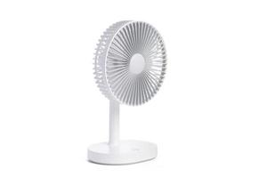 Battery powered white table fan isolated on white background with clipping path. portable battery fan photo