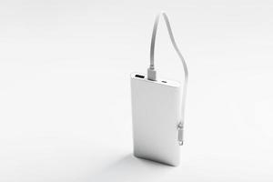 Power bank for charging mobile devices and gadgets on a white background photo