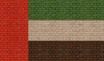 3d bandera de los emiratos árabes unidos en la pared de ladrillo foto