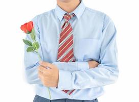 Man holding with red rose on white background photo