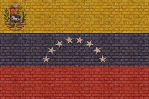 3d bandera de venezuela en pared de ladrillo foto