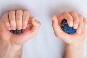 Massage rubber balls in hands. photo