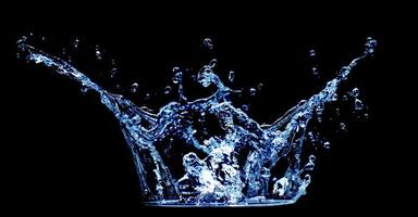 splashing water on a black background photo