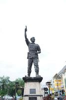 Solo, Central Java, Indonesia, 2020 -  Indonesian war hero statue, general Slamet Riyadi award in the city of Solo who stands tall photo