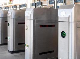 View of the station turnstiles waiting for crowds of passengers photo