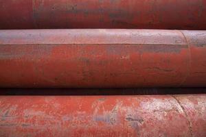 Rusted iron steel metal pipes can be used as an industrial texture background photo