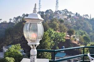 Early morning view of Modern rooftop restaurant at Kasauli, Himachal Pradesh in India, View of mountain hills from open air restaurant in Kasauli, Kasauli Rooftop restaurant photo