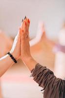 women hands touch, meditation practice session. No stress, reducing fatigue after work activity, wellness and female community support photo