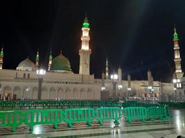 Medina, Saudi Arabia, Oct 2022 - Beautiful view of Masjid Al Nabawi Madinah in night lights. Masjid Al Nabawi Medina presents a very beautiful scene in the night lights. photo