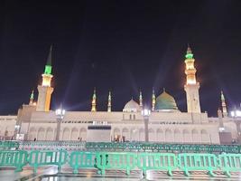 Medina, Saudi Arabia, Oct 2022 - Beautiful view of Masjid Al Nabawi Madinah in night lights. Masjid Al Nabawi Medina presents a very beautiful scene in the night lights. photo