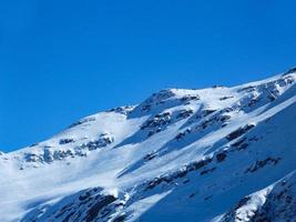 Winter mountains, white snow-capped mountain peak. Mountains of the North Caucasus. photo