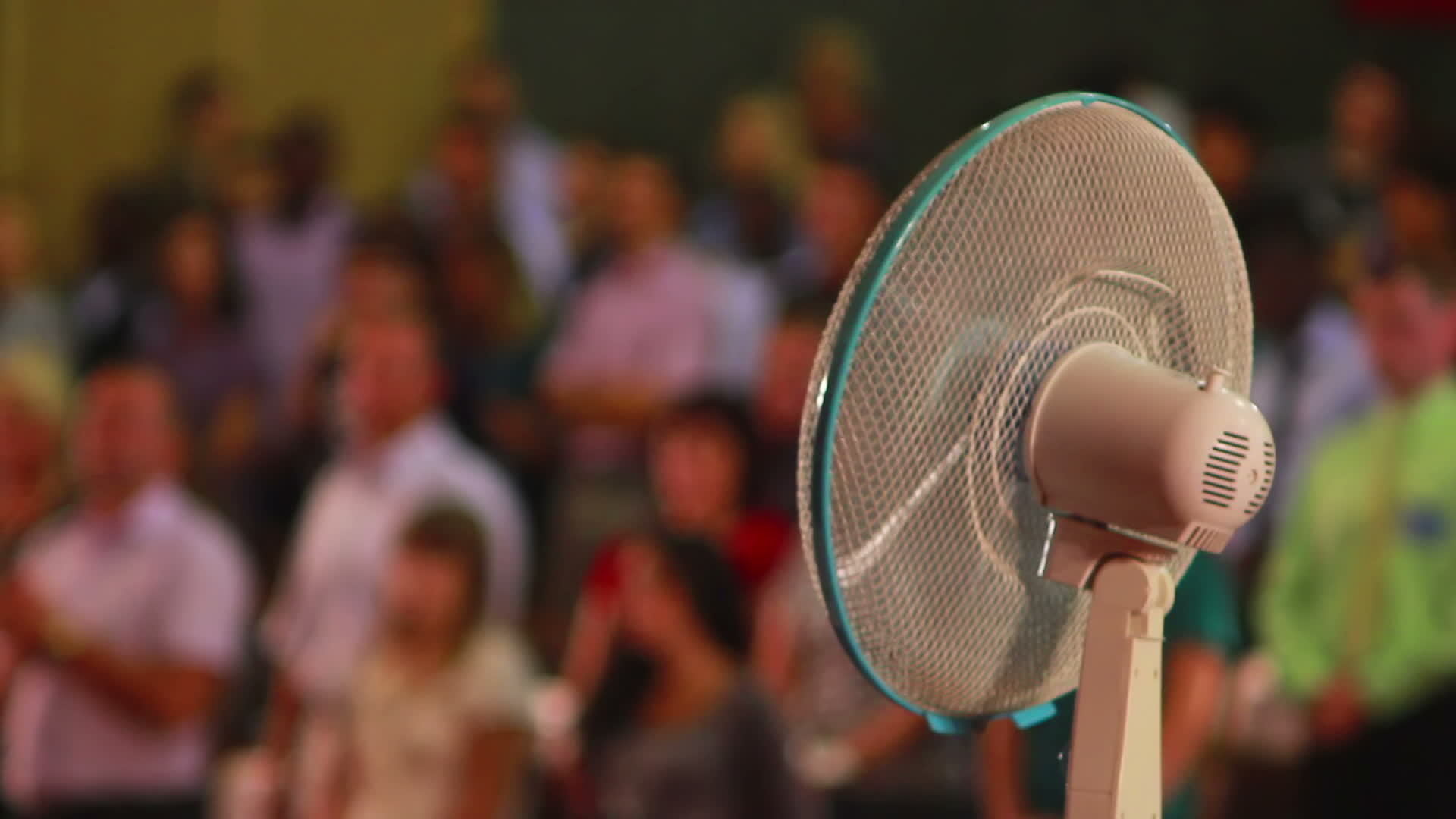 Indoor Fan blows air on people and turns 13104845 Stock Video at Vecteezy