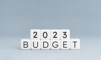 2023 budget message on block shape isolated on blue background. Copy space photo