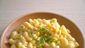 macaroni with creamy corn cheese on plate video