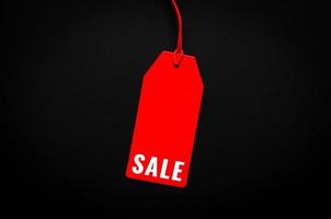 etiqueta de precio roja con palabra para compras y venta en concepto de viernes negro. foto