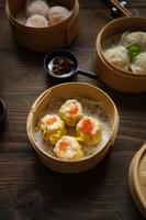 Vertical view of various dims in the bamboo basket. photo