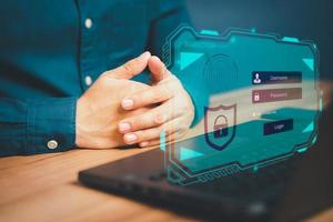 Man login with fingerprint scanning technology in the computer. Secure encryption and access to the user's private information to access the Internet. photo