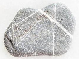 Greywacke sandstone on white photo