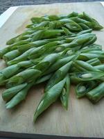 pieces of chickpeas with scientific name Phaseolus vulgaris which are ready to be processed into a lunch menu photo