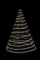 Defocused lights Christmas tree on black isolated background. Design element. New Year. Copy space photo