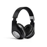 Modern black wireless headphones isolated on white background with clipping path. photo