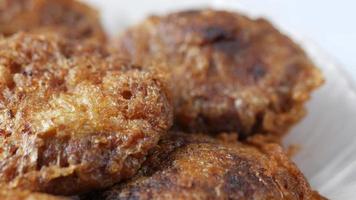 Close up texture of fried food on plate video