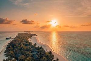 Luxury travel vacation destination panoramic banner. Romantic honeymoon getaway in overwater bungalows villas, Maldives islands. Amazing sunset view, beautiful exotic coast, beachside photo