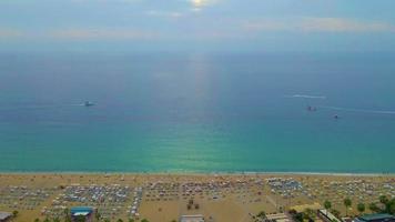 Alanya  beach, panorama. Panoramic view of the sandy beach. The sea wave rolls on the shore. Sea coast view from the air. Aerial photography of the sea wave. The ocean and beach. video