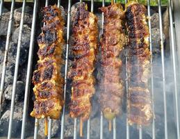 grilled meat from the charcoal grill photo