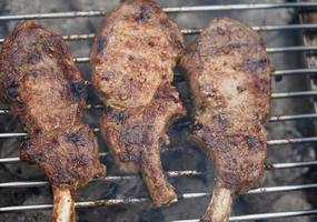 grilled meat from the charcoal grill photo