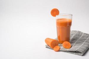 Carrot juice on white background , healthy eating concept photo