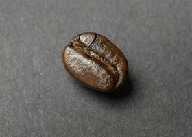 Coffee bean roasted on black background photo