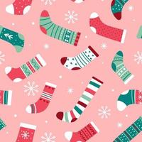 Christmas seamless pattern with bright Christmas socks and snowflakes on a pink background Vector illustration