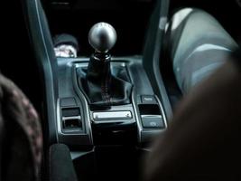 Close-up view of the manual transmission gear shifter photo